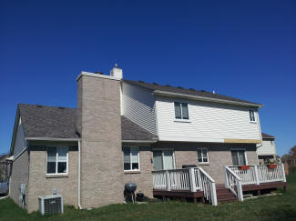 Vinyl siding and certainteed weather wood roof