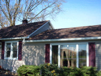 Wolverine American legend house siding and new roof